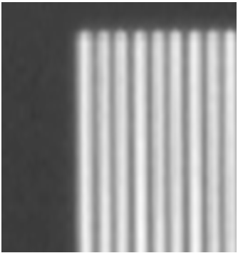 Text Box:  
Figure 4-2: Optical micrograph of the aluminium pattern on the tip finder target. Width=960 microns, height=768 microns.
